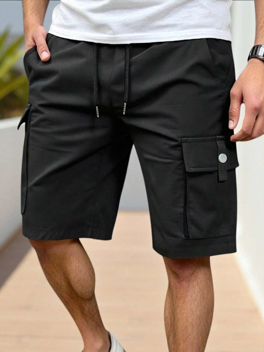 Manfinity CasualCool 男士成熟休閒彈性腰多口袋工裝短褲,適合日常休閒、週末出遊、旅行、朋友聚會等。這款短褲是男士衣櫥中必不可少的百搭單品,是送給男朋友或丈夫的完美禮物 - 黑色 - 查看 1