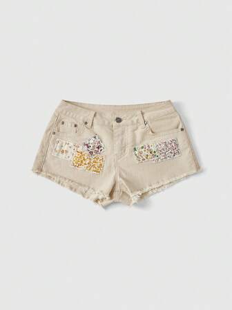 Sweetness Pantaloncini di jeans da donna a vita ultra bassa con patchwork floreale e orlo sfilacciato, realizzati a mano, primavera/estate