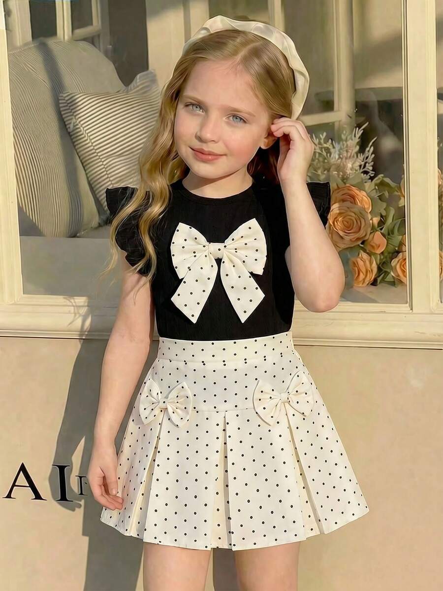 Elladie kids 女童春夏季2件套:黑色針織提花圓領荷葉袖T恤搭配杏色圓點蝴蝶結前裝飾 & 杏色圓點印花半鬆緊腰裙配2個蝴蝶結,適合日常穿著、旅行、度假和聚會 - 杏色 - 查看 1