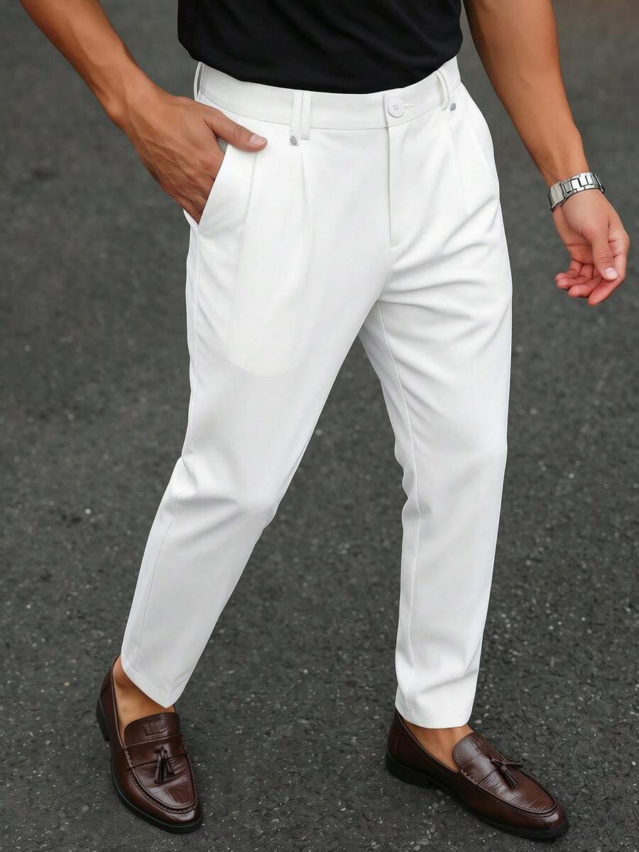 Manfinity Mode Quần tây nam công sở casual màu trơn xếp ly dáng côn, phù hợp mặc đi làm hàng ngày, đi lại, dạo phố cuối tuần, dự tiệc và nhiều dịp khác. Chiếc quần này là món đồ đa năng không thể thiếu trong tủ đồ nam, là món quà hoàn hảo cho bạn trai hoặc chồng - trắng - Xem 1
