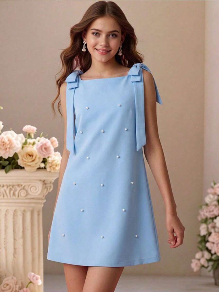 SHEIN Pitira 青少年女孩純色淺藍色夏季可愛派對無袖梭織洋裝,珍珠裝飾蝴蝶結肩部串珠洋裝,青少年女孩雞尾酒會度假穿搭 - 淺藍色 - 查看 1