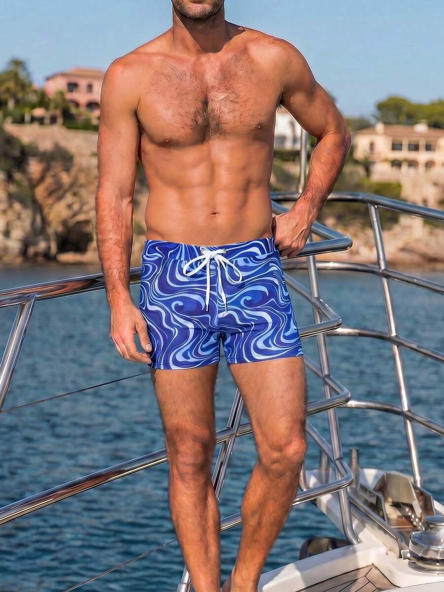 Manfinity Swimmode 男士蓝色波浪纹弹力腰夏季泳裤 男女情侣泳装 情侣泳装 度假情侣泳衣套装 情侣沙滩装 情侣蓝色情侣泳衣 男女通用泳衣 男士泳装 男士泳装 男女通用沙滩装 情侣泳装套装 情侣泳衣 男士泳裤 女士连体泳衣 - 彩色 - 查看 1