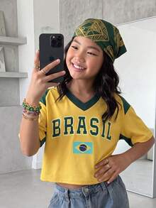 SHEIN Sparklyn Camiseta de manga corta holgada con cuello en V y diseño de número de equipo deportivo para niñas preadolescentes, moda urbana, vacaciones, verano, viajes - Amarillo - Ver 3