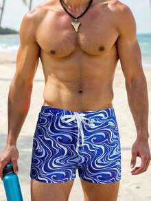 Manfinity Swimmode 男士蓝色波浪纹弹力腰夏季泳裤 男女情侣泳装 情侣泳装 度假情侣泳衣套装 情侣沙滩装 情侣蓝色情侣泳衣 男女通用泳衣 男士泳装 男士泳装 男女通用沙滩装 情侣泳装套装 情侣泳衣 男士泳裤 女士连体泳衣 - 彩色 - 查看 4