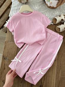 SHEIN 2 piezas/Conjunto casual de verano para niña bebé: Top casual de manga corta con estampado floral y patchwork con lazo de cinta y pantalones largos. Ropa cómoda adecuada para actividades al aire libre - Rosa - Ver 6
