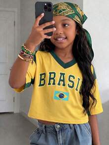 SHEIN Sparklyn Camiseta de manga corta holgada con cuello en V y diseño de número de equipo deportivo para niñas preadolescentes, moda urbana, vacaciones, verano, viajes - Amarillo - Ver 5