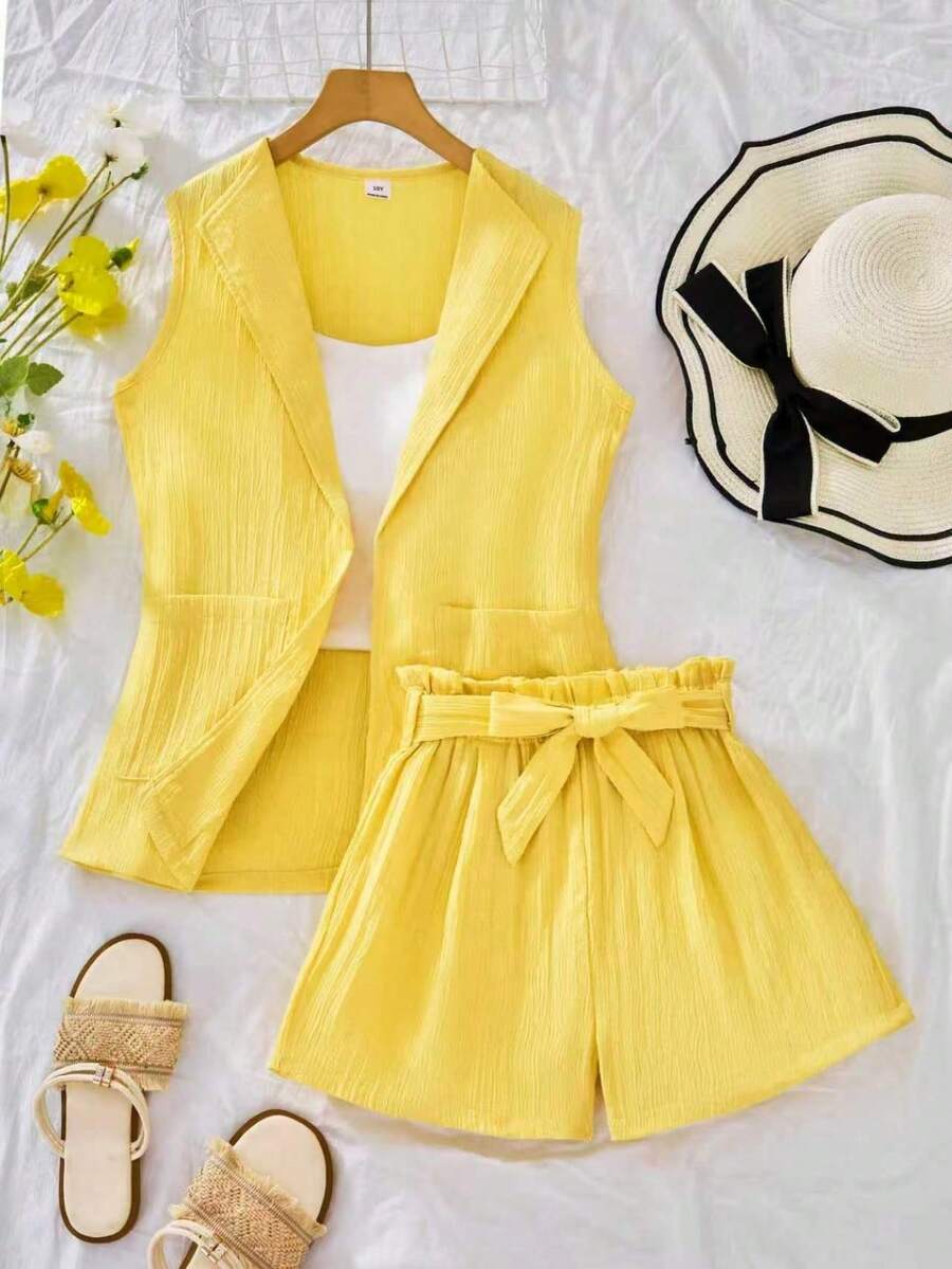 SHEIN Bộ đồ gồm 2 món: áo khoác blazer không tay dệt jacquard và quần short cạp chun xếp ly cho bé gái, thích hợp mặc hàng ngày, đi làm hoặc đi nghỉ mát vào mùa xuân/hè. - Màu vàng - Xem 1