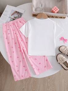SHEIN 2pcs/Sets Young Girl Basic Casual Slouchy Solid Color Set, Horse Print, Asymmetric Hem, Side Ruched Design, Round Neck Short Sleeve T-Shirt, Paired With Yellow Striped Textured Fabric Straight Leg Pants Set, Suitable For Daily/Outing Multiple Occasions, Spring/Summer/All Seasons Style, Toddle Girls Sets, Children Daily Comfortable Summer Outfit, Girls Outfits - Multicolor - View 2