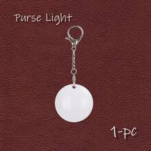 A USB-Rechargeable LED Night Light-A Cute, Portable Accessory For Ladies' Handbags. This Mini Keychain Light Is The Ideal Companion For On-The-Go Use At Night. - Keychain light - View 2