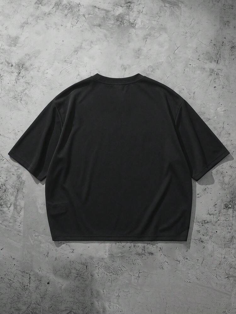 Camiseta Oversized de Gola Careca com Detalhe de Pesponto Contrastante e Painel Bicolor