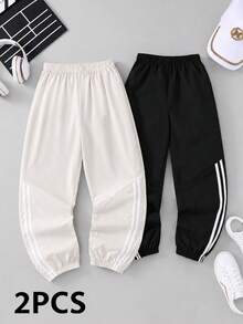 SHEIN Explorewe 2-Pack Tween Boys All-Match Versatile Side Asymmetrical Stripe Solid Color Pants Elastic Cuff Loose Fit Casual Trousers - Black and White - View 1