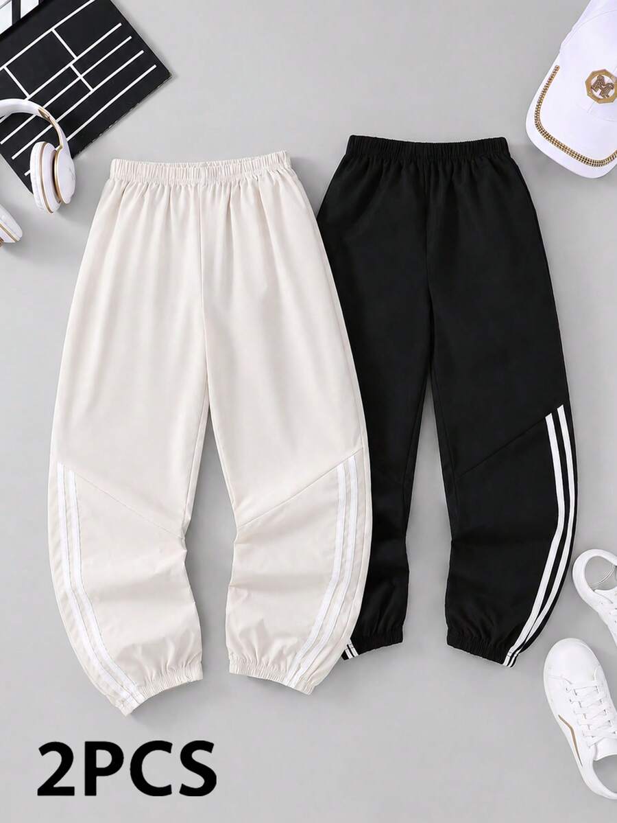 SHEIN Explorewe 2-Pack Tween Boys All-Match Versatile Side Asymmetrical Stripe Solid Color Pants Elastic Cuff Loose Fit Casual Trousers - Black and White - View 1