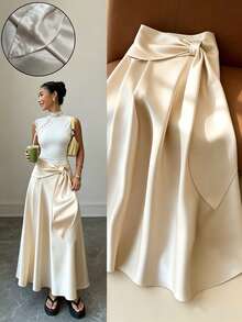 SHEIN Holidaya Women's Champagne Satin High Waist Maxi Skirt, Bow Tie Waist A-Line Flowy Long Skirt, Elegant Formal Skirt For Wedding Guest Party Dinner - Apricot - View 1