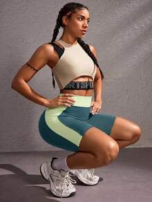 Powerista 女款拼接修身休閒運動短褲，適合日常健身、健身房及日常穿著 - 墨綠色 - 查看 4
