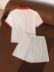 SHEIN American Retro Colorblock Polo Collar Design, Cream & Red Trim Eye-Catching! English Print + Number Elements, Effortlessly Wear Street Style Girl Vibe. Knitted Fabric Refreshing, Top + Shorts Set, Suitable For Sports And Street, Essential For Energetic Girls In Summer! - Beige - View 2