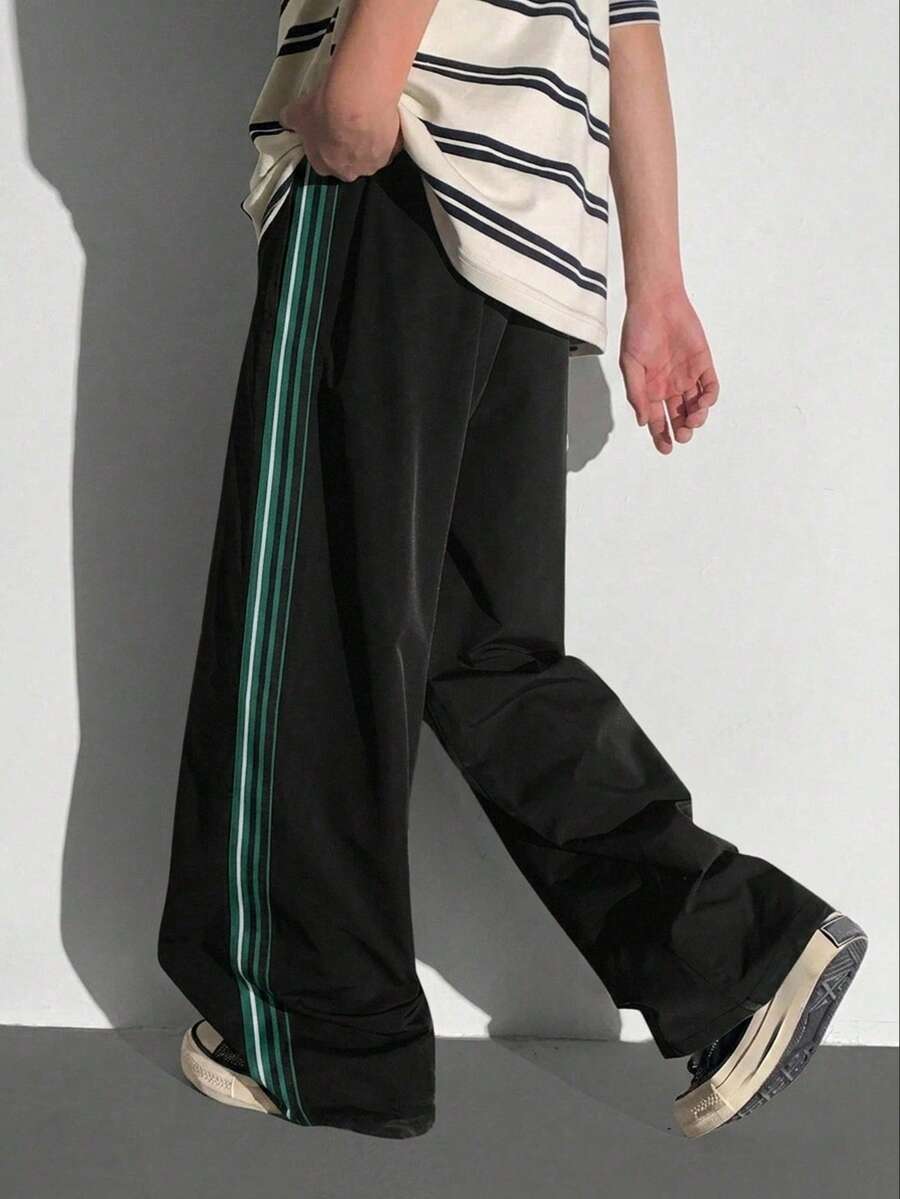SHEIN 青少年男孩休閒日常舒適拼接彈性腰鬆直筒素色梭織長褲運動褲慢跑褲防風褲綠色黑色褲子適合春夏日常穿著運動出遊上學派對節慶拍照 - 黑色 - 查看 1