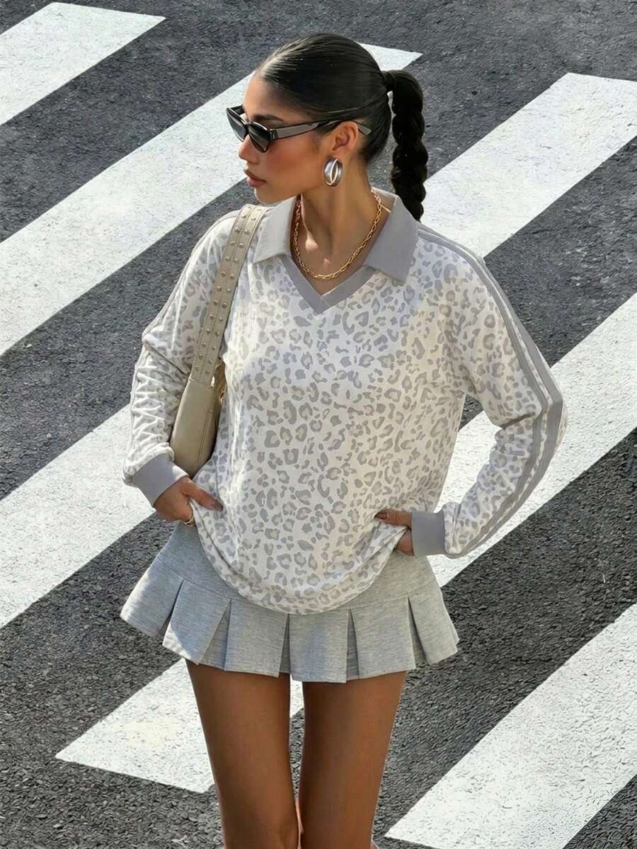 Muchica 女款休閒淺黃色 Polo 衫,配對比棕色領口與條紋袖子。馬匹印花增添復古、學院風、經典、時尚、青春與街頭感。面料光滑舒適,秋季理想之選。 - 彩色 - 查看 1