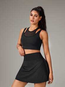 OutZeal Top deportivo para mujer color negro con sujetador integrado, panel de malla, protección UV, para gimnasio y entrenamiento - Negro - Ver 6