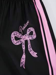 SHEIN 青少年女孩休閒時尚街頭風圓領粉色拼接黑色蝴蝶結圖案落肩寬鬆短袖上衣與寬腿蝴蝶結圖案長褲2件套 春夏 - 彩色 - 查看 7