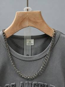 SHEIN Genkimix Kids 男童美式街頭風無袖T恤套裝，1件背心與1件短褲，簡約舒適設計，適合夏季運動或休閒穿著，薄荷綠寬鬆版型圓領背心，胸前3D壓花字母印花「LOS ANGELES」與「CALIFORNIA」，3D壓花字母印花短褲 - 深灰色 - 查看 7