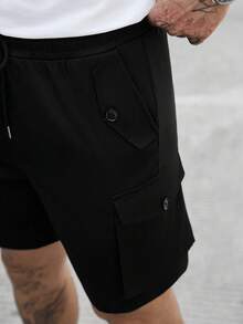 Manfinity Homme 男士大尺碼休閒工裝短褲，適合日常通勤、旅行、休閒穿著、週末出遊、戶外活動、旅行探險及其他社交場合。這款短褲是男士衣櫥中不可或缺的多功能單品，也是送給男朋友或丈夫的絕佳禮物 - 黑色 - 查看 7