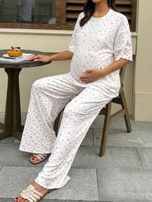 Dazy Maternity طقم نسائي من قطعتين للحمل، ملابس علوية بيضاء فضفاضة بأكمام قصيرة وبنطال طويل بنقشة زهور صغيرة متكررة، ملابس منزلية يومية للربيع والصيف - أبيض - مشاهدة 7
