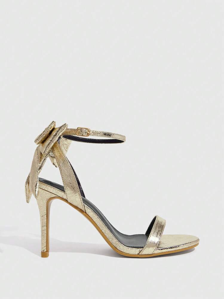 CUCCOO SZL Women's Spring/Summer New Metallic Glossy Bow Decor Thin Strap Design Round Toe Stiletto High Heel Fashion Eye-Catching Elegant Luxury Gold Shiny Sandals Open Back Shoes For Party Evening Date Summer Outfit