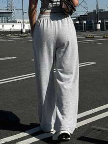 DAZY 女款休閒運動日常通勤簡約百搭素色抽繩腰鬆寬腿運動長褲 - 灰色 - 查看 2