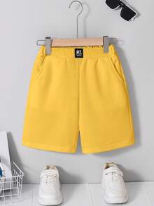 SHEIN Tween Boy Casual Comfortable Patchwork Solid Color 5-Inch Slant Pocket Shorts - Yellow - View 1