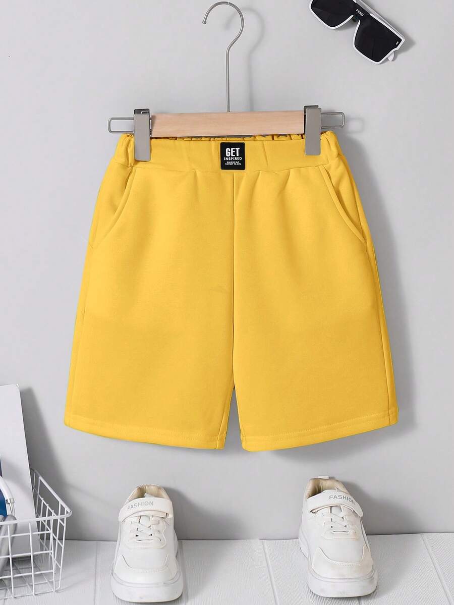 SHEIN Tween Boy Casual Comfortable Patchwork Solid Color 5-Inch Slant Pocket Shorts - Yellow - View 1