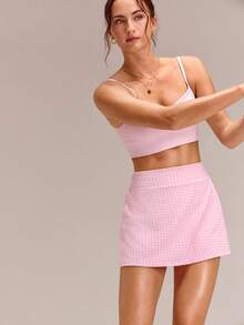 GLOWMODE Falda de entrenamiento de 4.5" cómoda y elástica con control de abdomen 360°, cintura ultra alta en forma de V, volantes en la cadera y pantalones cortos integrados, para tenis, golf y uso diario, secado rápido, primavera y verano - Rosa - Ver 7