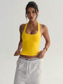 Dewbera Dewbera 女款無縫瑜珈運動內衣，無鋼圈健身上衣，交叉設計運動背心，跑步內衣 - 芥末黃 - 查看 3