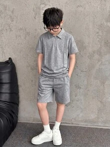 SHEIN 兒童青少年男童深藍色極簡剪影細節POLO衫 休閒學院風 舒適時尚 簡約實用百搭 柔軟面料 適合日常穿著 適合上學 適合旅行 適合返校季 適合假期派對 適合夏季海灘度假 適合夏季氛圍 適合春夏穿著 - 灰色 - 查看 4