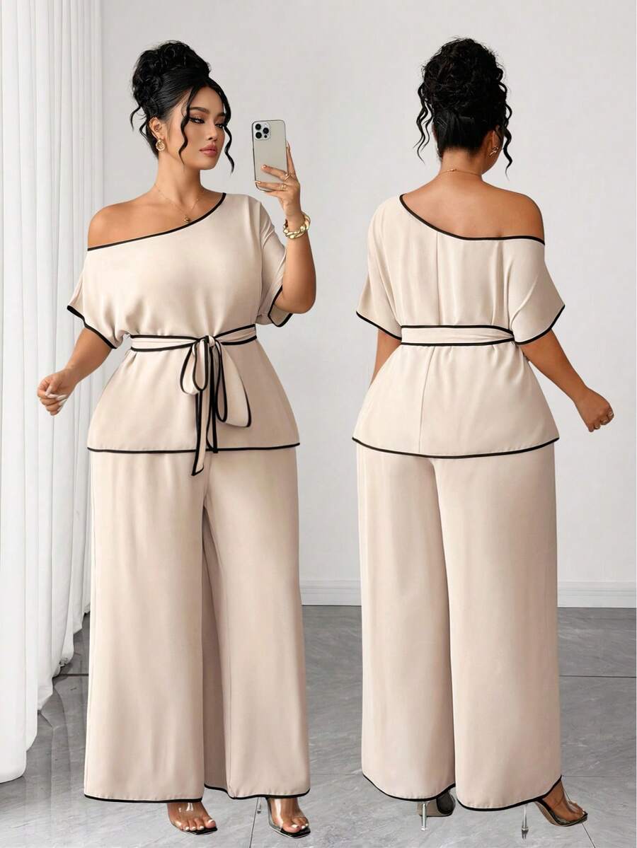 Weeklong 2-delat set för dam i plus size med asymmetrisk axel, färgblockad urringning, markerad midja, kortärmad topp och långa vida byxor, casual - Kaki - Visa 1