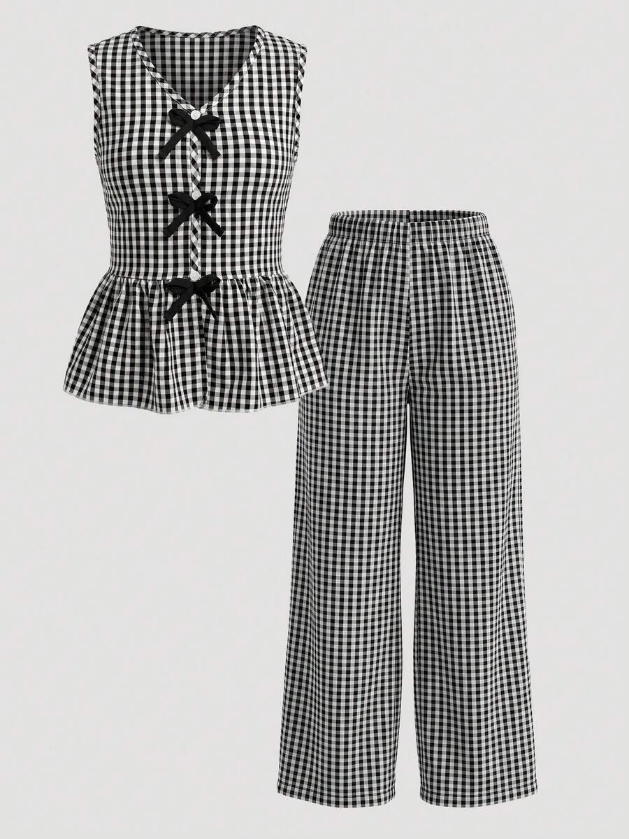 Elladie kids 少女無袖V領上衣，經典黑白格紋配黑色蝴蝶結裝飾，協調且永恆的風格。無袖上衣+寬腿褲套裝，將青春魅力與簡約優雅融合，非常適合春夏穿著。