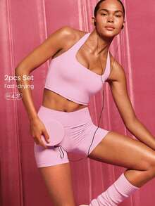 GLOWMODE Conjunto deportivo FeatherFit™-Sculpt de top deportivo de halter ajustable y shorts activos con cruce en Y de 4.3" para la cintura, de impacto medio, para entrenamiento, trotar y gimnasio - Rosa Pálido - Ver 1
