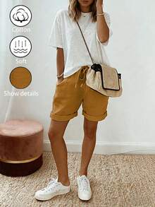 SHEIN Holidaya 女款夏季新款棉麻度假休閒風卡其色抽繩捲邊短褲，採用棉麻紋理面料，搭配彈性腰抽繩設計與捲邊細節，融合隨性與俐落優雅，適合日常出遊、度假或輕便休閒場合，屬於休閒風抽繩短褲、卡其優雅褲款，寬鬆顯瘦百搭單品 - 芥末黃 - 查看 5