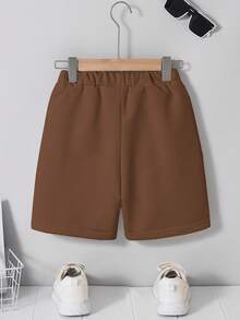 SHEIN Pantalones cortos casuales y cómodos para niño preadolescente con patchwork, unicolor, largo hasta la rodilla y bolsillos inclinados - Marrón - Ver 2