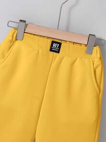 SHEIN Tween Boy Casual Comfortable Patchwork Solid Color 5-Inch Slant Pocket Shorts - Yellow - View 3