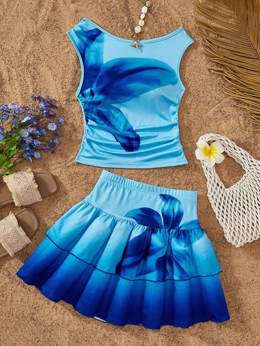 Girls' Sweet Gradient Set, Asymmetric Shoulder Sleeveless Cropped Top With Ruched Waist Design To Fit And Shape The Body, Double-Layer Ruffle Cake Mini Skirt For A Lively And Playful Look. Deep Blue To Light Blue Gradient Tie Dye With Large Floral Print For A Full Atmosphere. Suitable For Parties, Outings And Travel, Easily Create A Gentle And Sparkling Look. - Multicolor - View 1