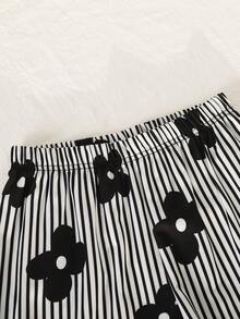 SHEIN 青少年女孩 T-shirt 套裝，運動風粉色與深綠色拼接短袖 T-shirt 與短褲套裝，夏季寬鬆貼身設計，輕量面料，適合日常外出、休閒運動或造型穿搭 - 黑與白 - 查看 8