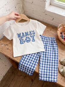 SHEIN Vintaside Kids طقم من قطعتين لملابس الأطفال الأولاد، ملابس علوية قصير الأكمام كاجوال لطيف وبنطال كاروهات، مناسب للصيف والسفر - الأزرق - مشاهدة 7