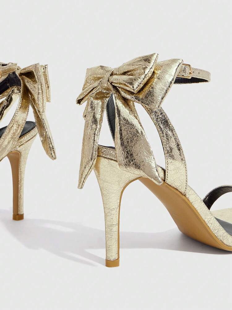 CUCCOO SZL Women's Spring/Summer New Metallic Glossy Bow Decor Thin Strap Design Round Toe Stiletto High Heel Fashion Eye-Catching Elegant Luxury Gold Shiny Sandals Open Back Shoes For Party Evening Date Summer Outfit
