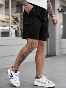 Manfinity Homme 男士大尺碼休閒工裝短褲，適合日常通勤、旅行、休閒穿著、週末出遊、戶外活動、旅行探險及其他社交場合。這款短褲是男士衣櫥中不可或缺的多功能單品，也是送給男朋友或丈夫的絕佳禮物 - 黑色 - 查看 4