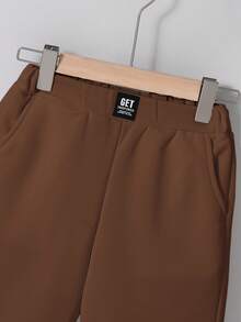SHEIN Pantalones cortos casuales y cómodos para niño preadolescente con patchwork, unicolor, largo hasta la rodilla y bolsillos inclinados - Marrón - Ver 3