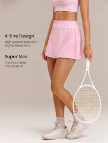 GLOWMODE Falda de entrenamiento de 4.5" cómoda y elástica con control de abdomen 360°, cintura ultra alta en forma de V, volantes en la cadera y pantalones cortos integrados, para tenis, golf y uso diario, secado rápido, primavera y verano - Rosa - Ver 4
