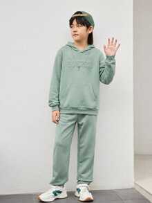 SHEIN Conjunto de 2 piezas para niño preadolescente con sudadera con capucha de unicolor con relieve y pantalones de punto, casual y cómodo - verde menta - Ver 6