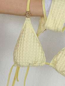 Swim Mod 2026 Spring/Summer Cream Yellow Textured Fabric Gold Flower Decor Halter Neck Side High Cut Tie String Thong Bikini Swimsuit 2-Piece Set For Women - Yellow - View 6