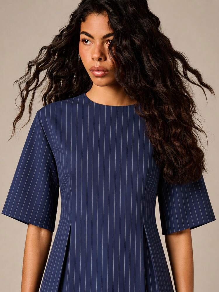 Blusa peplum listrada com mangas até o cotovelo