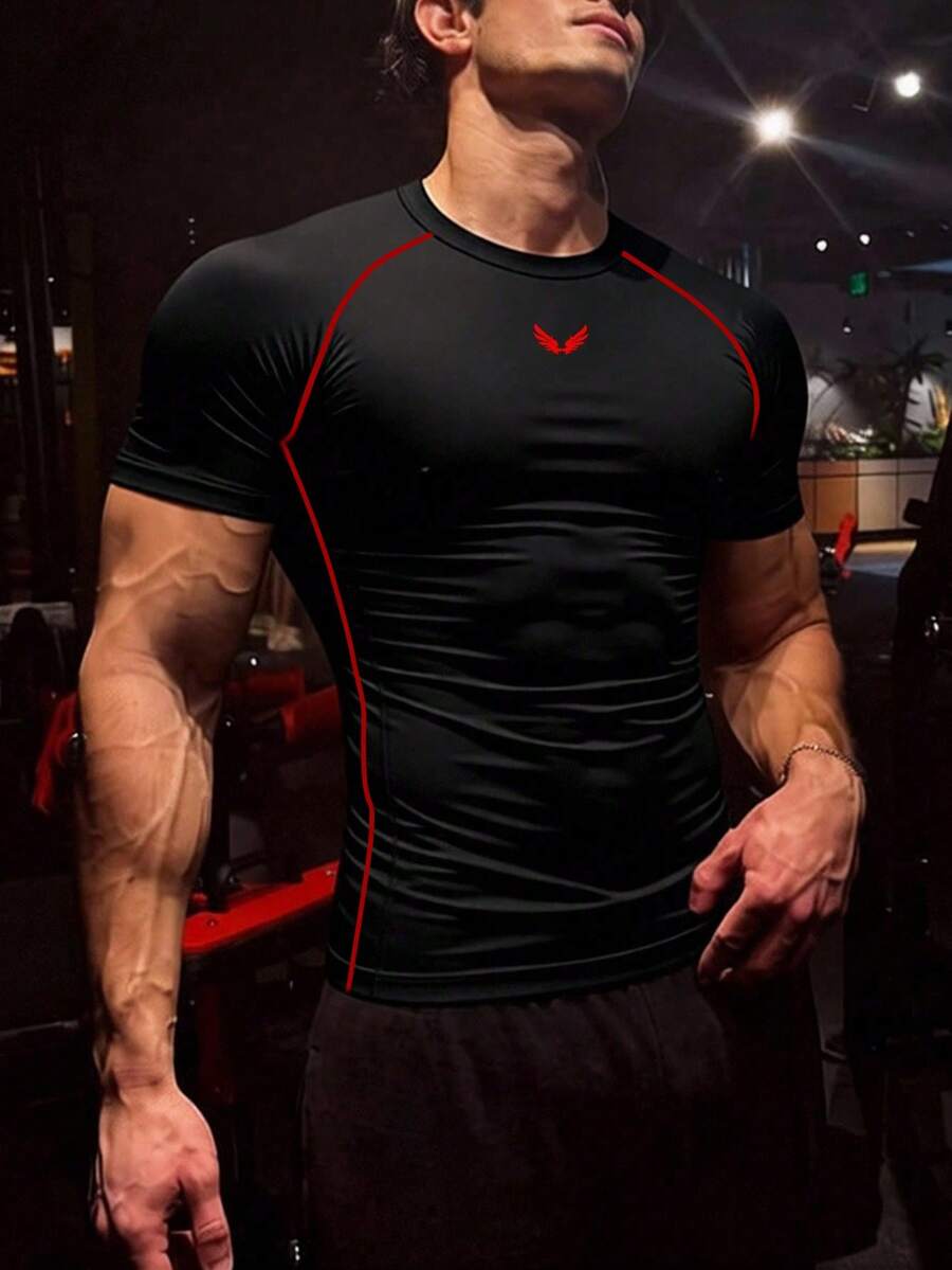 GymBeat Camiseta deportiva de manga corta con cuello redondo y estampado de alas para hombre - Negro - Ver 1